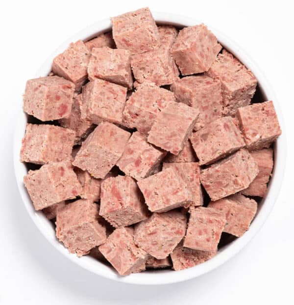 prime 100 beef and carrot SPD 2kg cut up into chunks in a dog bowl